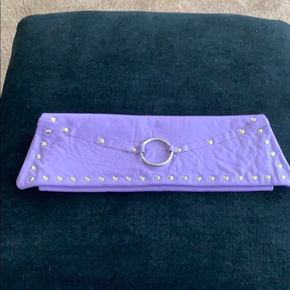Purple faux leather clutch